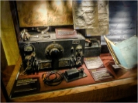 Radio Receiver And Headset.  A typical radio set used to listen in to foreign coded messages. A morse key can be seen in the foreground.