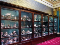 Sheffield Silver.  Another view of the cabinet showing articles made from solid silver. The oldest pieces are on the left and the more modern ones are to the right.